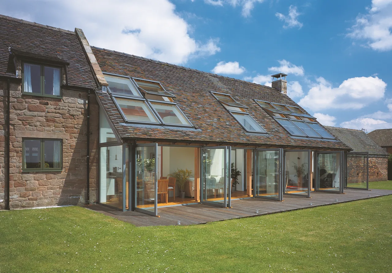 A house that has a lot of windows on it.